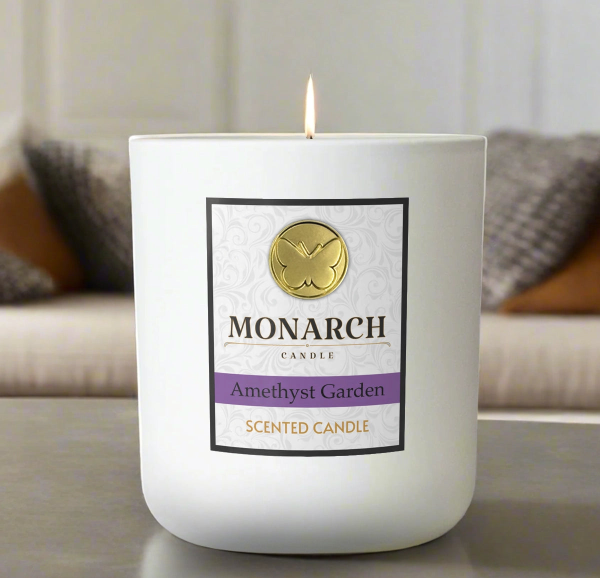 Monarch Candle labeled “Amethyst Garden” glowing gently in a white luxury glass vessel against a warm indoor background.