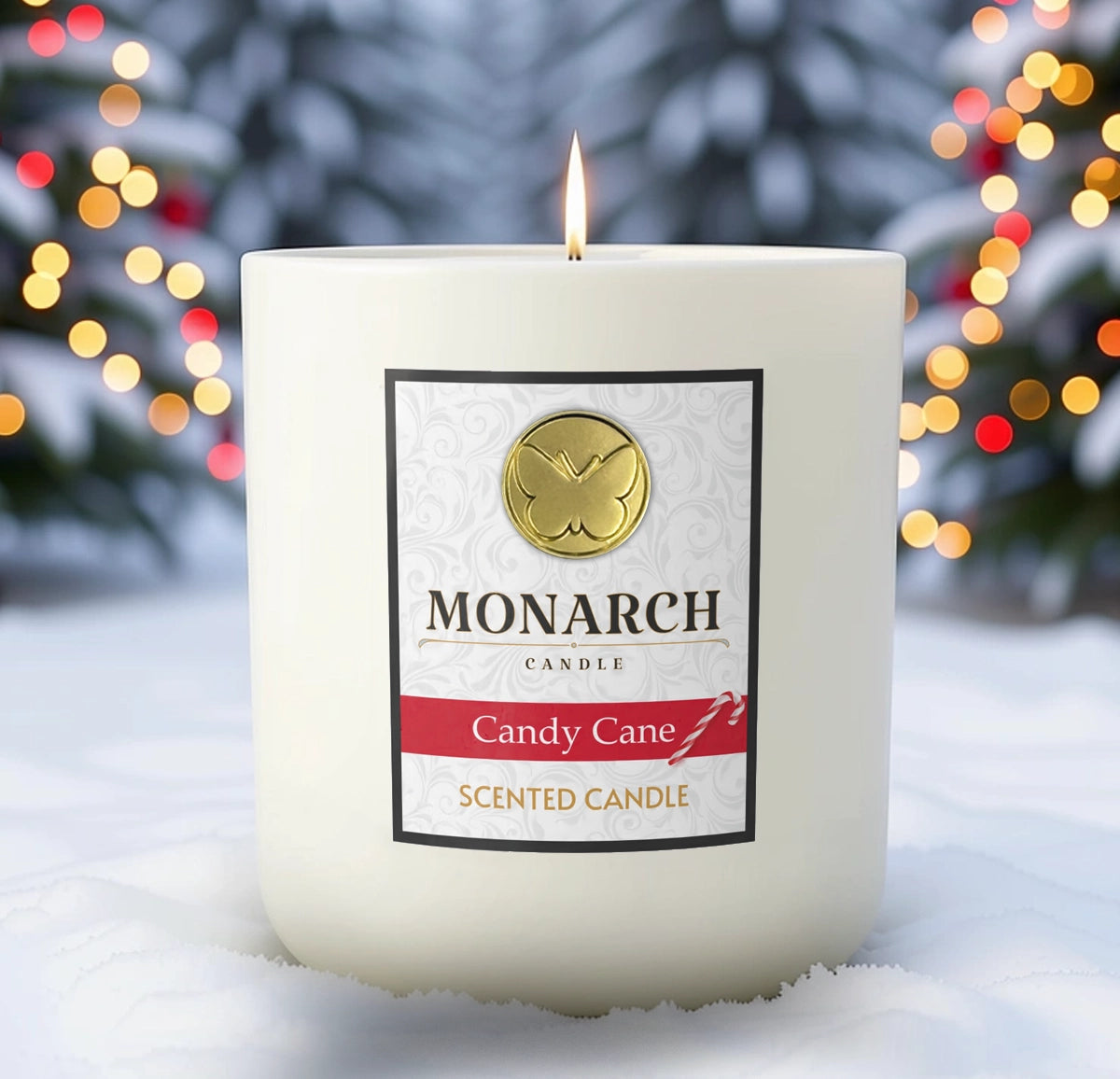 Monarch Candle labeled “Candy Cane” glowing gently in a white luxury glass vessel against a warm festive holiday background.