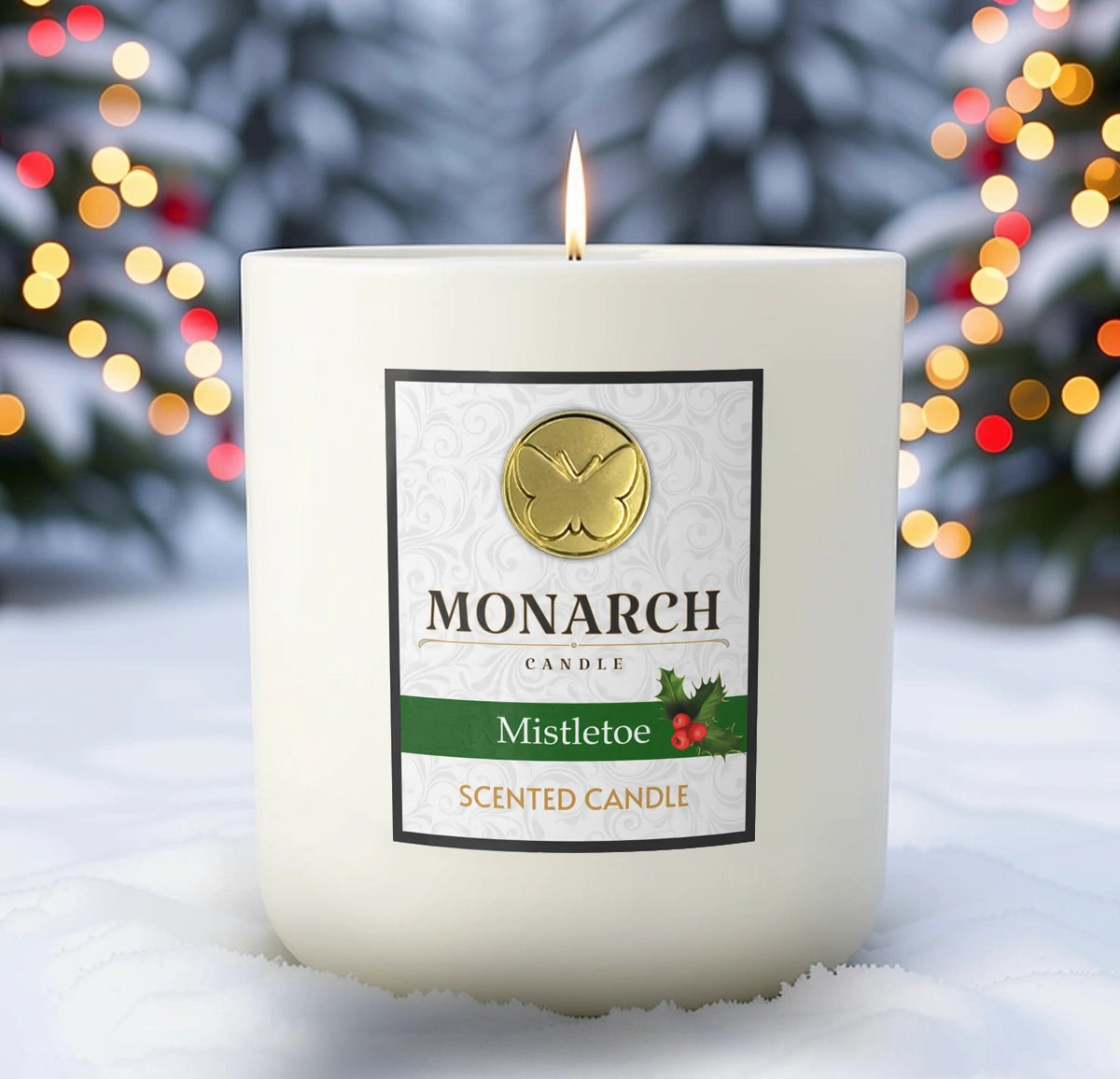 Monarch Candle labeled “Mistletoe” glowing gently in a white luxury glass vessel against a warm festive holiday background.