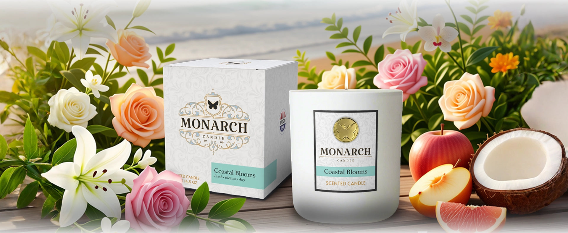 Monarch Candle "Coastal Blooms" Luxury Candle and box on a beautiful, floral coastal background with flowers, tropical fruit and the ocean in the background.