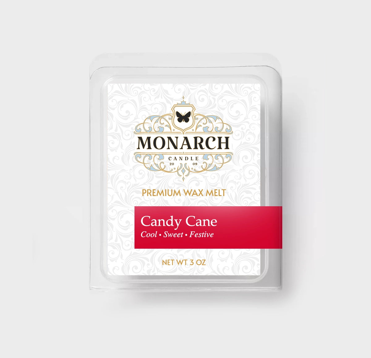 Monarch Candle premium wax melt packaging labeled “Candy Cane” displayed on a neutral gray background.