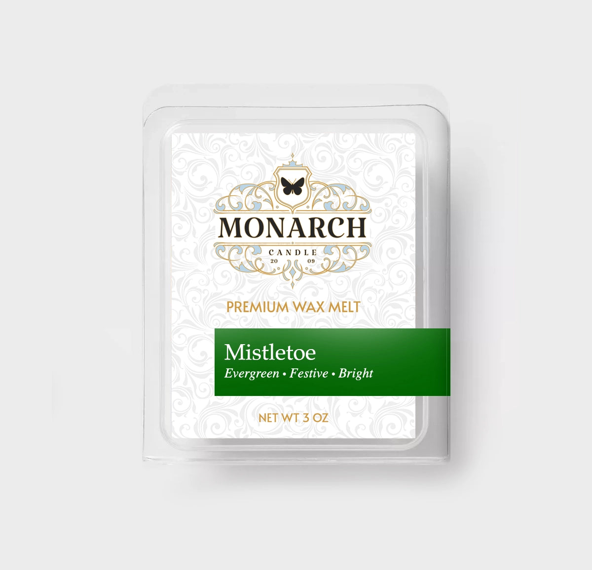 Monarch Candle premium wax melt packaging labeled “Mistletoe” displayed on a neutral gray background.