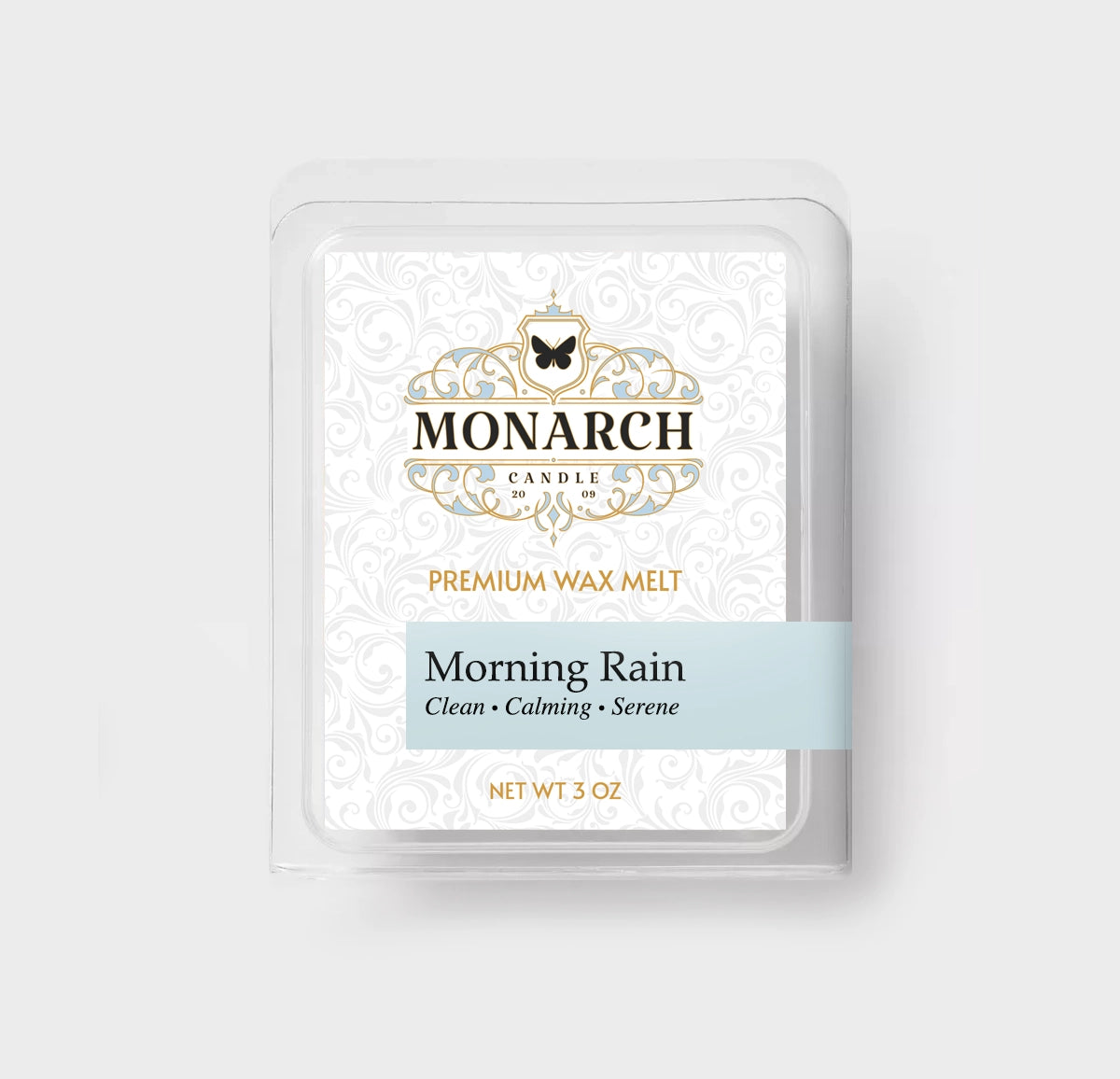 Monarch Candle premium wax melt packaging labeled “Morning Rain” displayed on a neutral gray background.