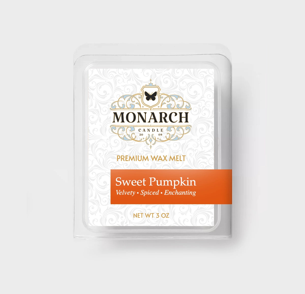 Monarch Candle premium wax melt packaging labeled “Sweet Pumpkin” displayed on a neutral gray background.