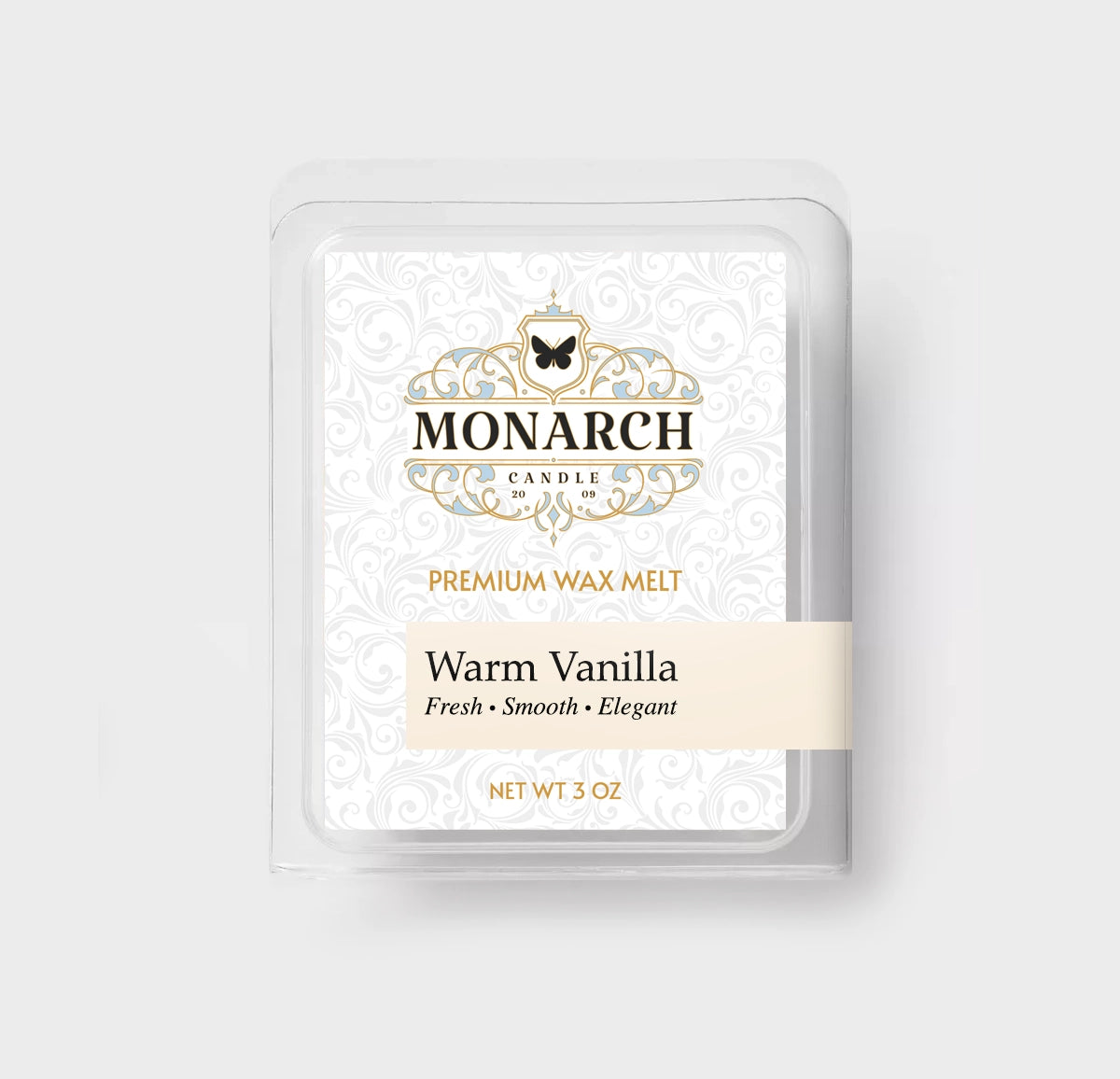 Monarch Candle premium wax melt packaging labeled “Warm Vanilla” displayed on a neutral gray background.