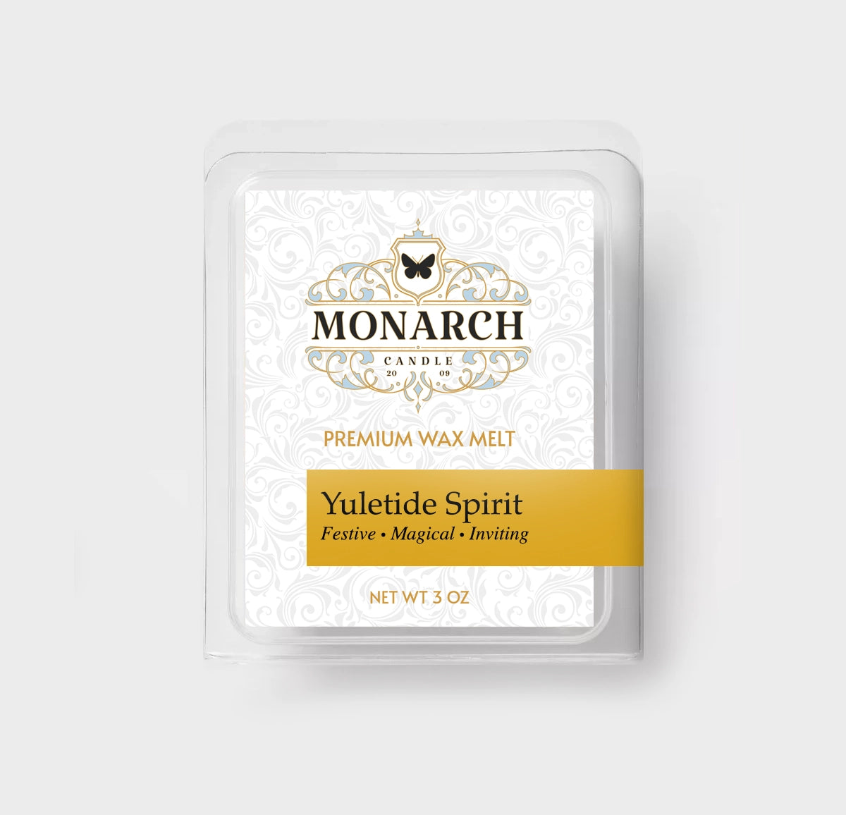 Monarch Candle premium wax melt packaging labeled “Yuletide Spirit” displayed on a neutral gray background.