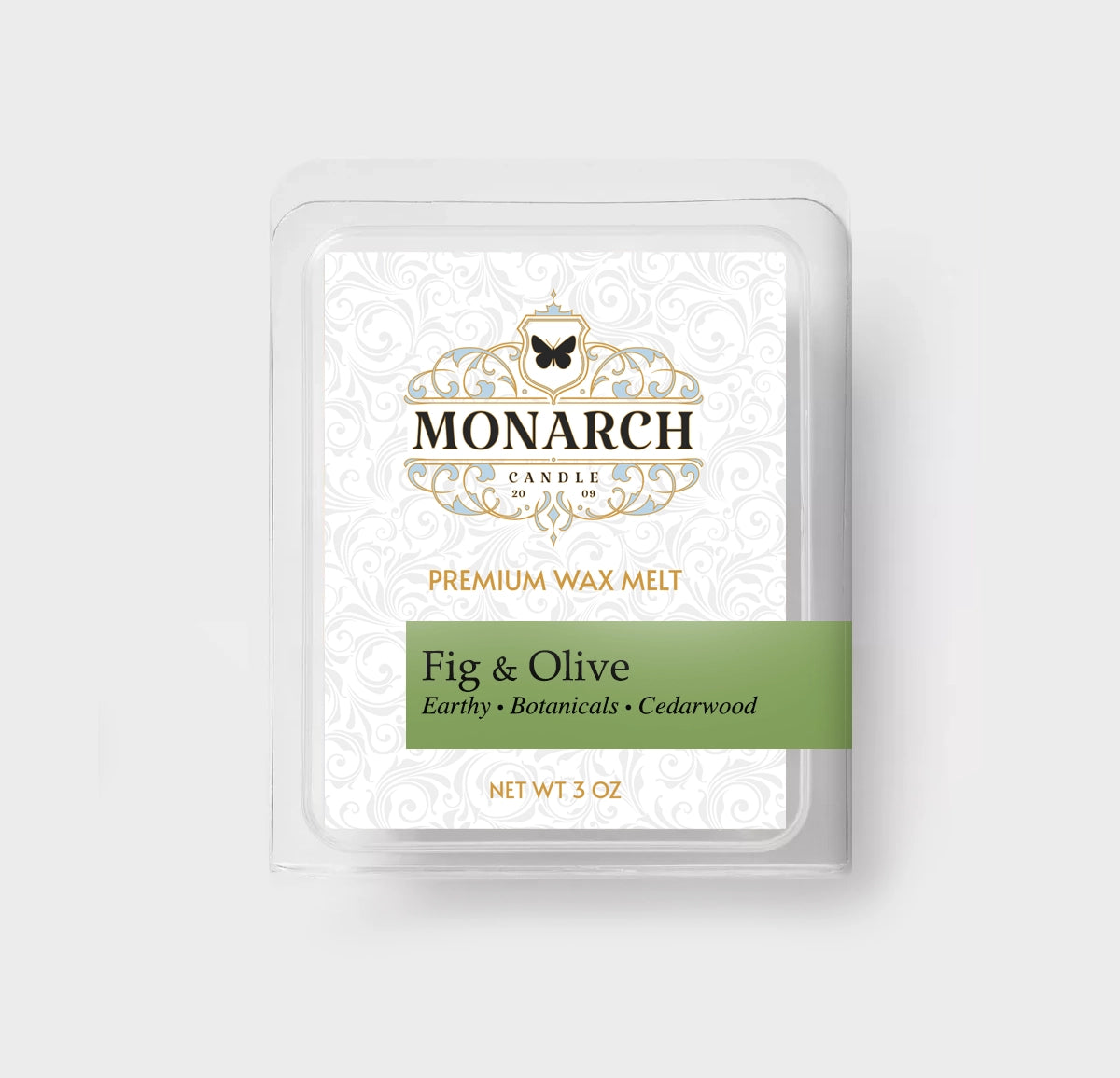 Monarch Candle premium wax melt packaging labeled “Fig & Olive” displayed on a neutral gray background.