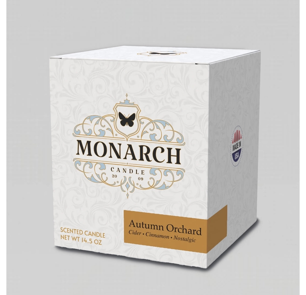 Monarch Candle box with "Autumn Orchard" scent label.