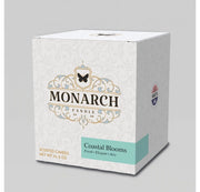 Monarch Candle box with "Coastal Blooms" scent label.