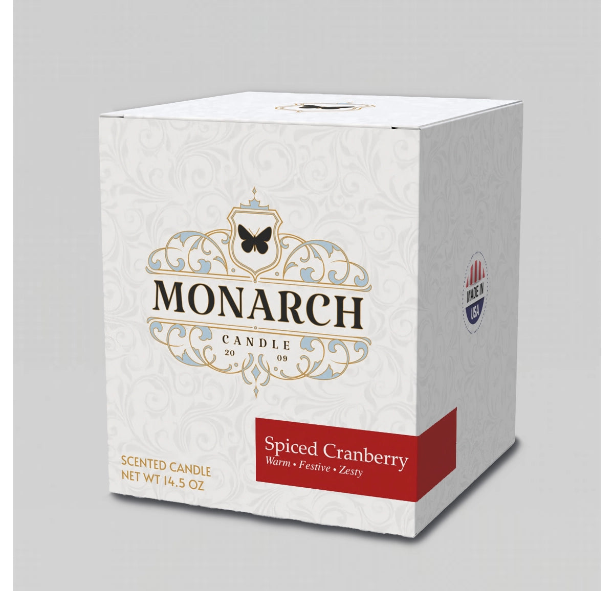 Monarch Candle box with "Spiced Cranberry" scent label.