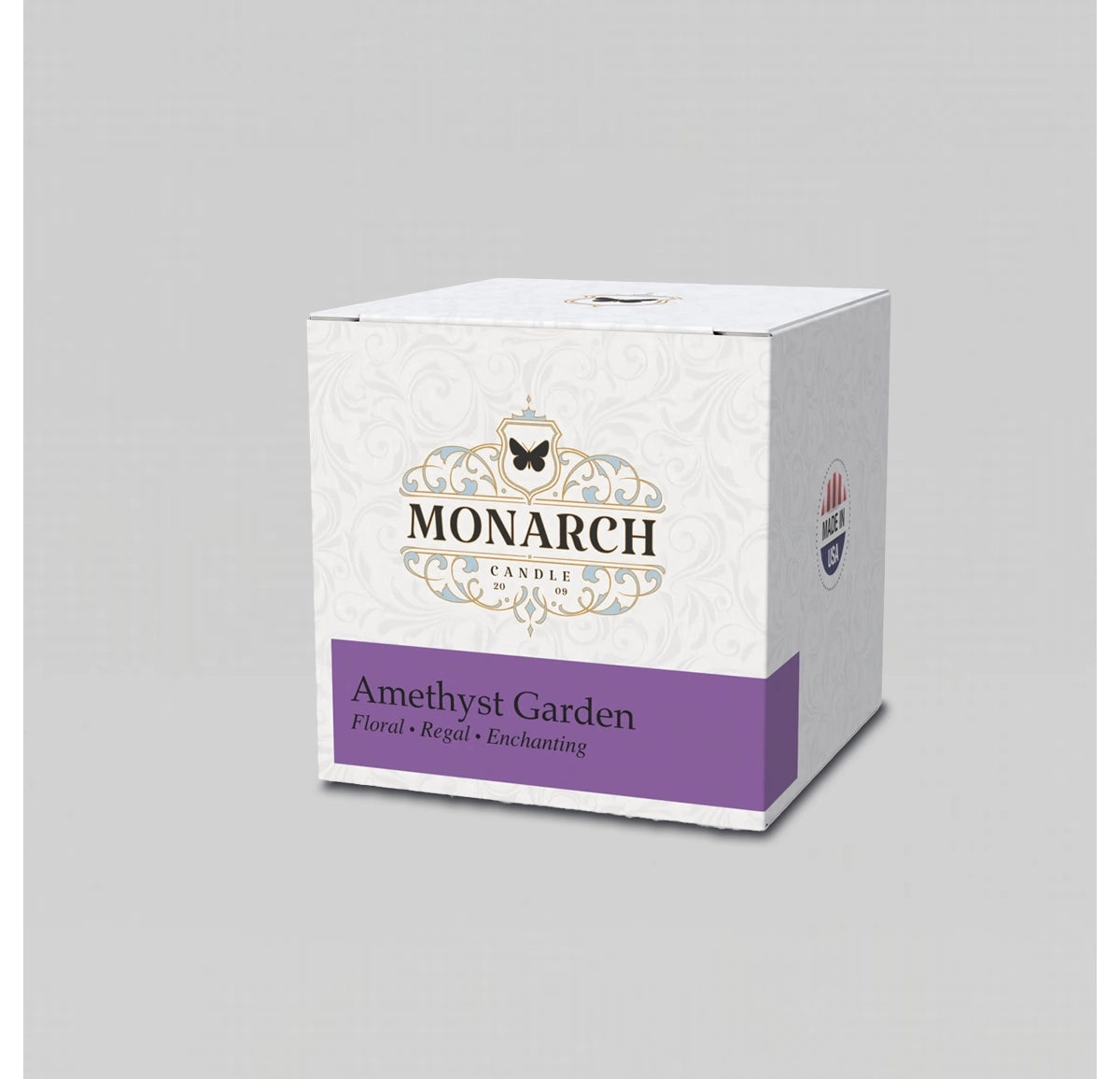 Monarch Candle votive box packaging labeled “Amethyst Garden” displayed on a neutral gray background.