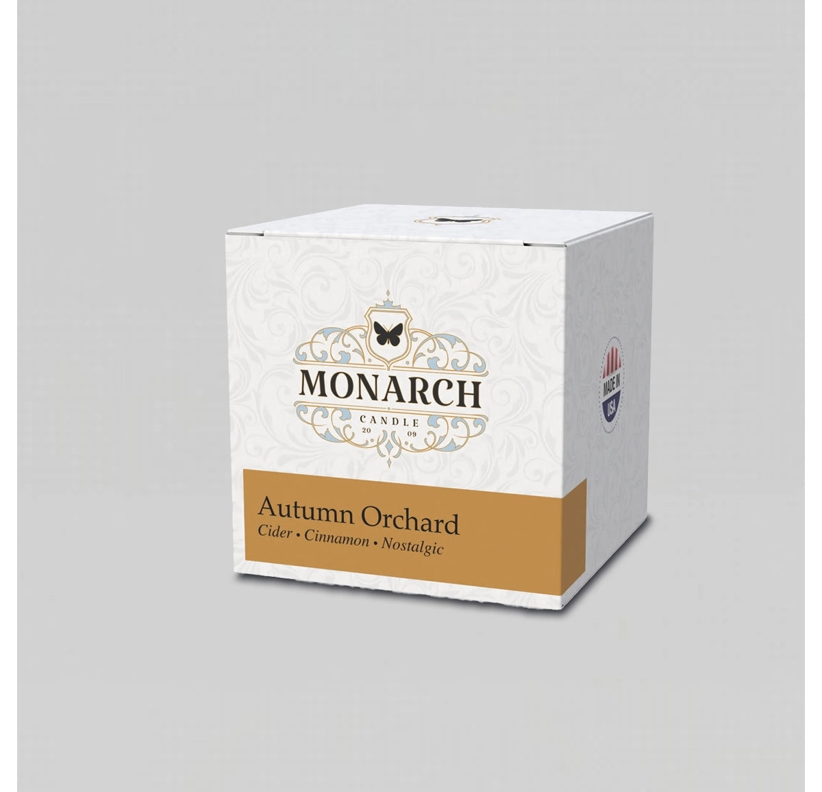 Monarch Candle votive box packaging labeled “Autumn Orchard” displayed on a neutral gray background.