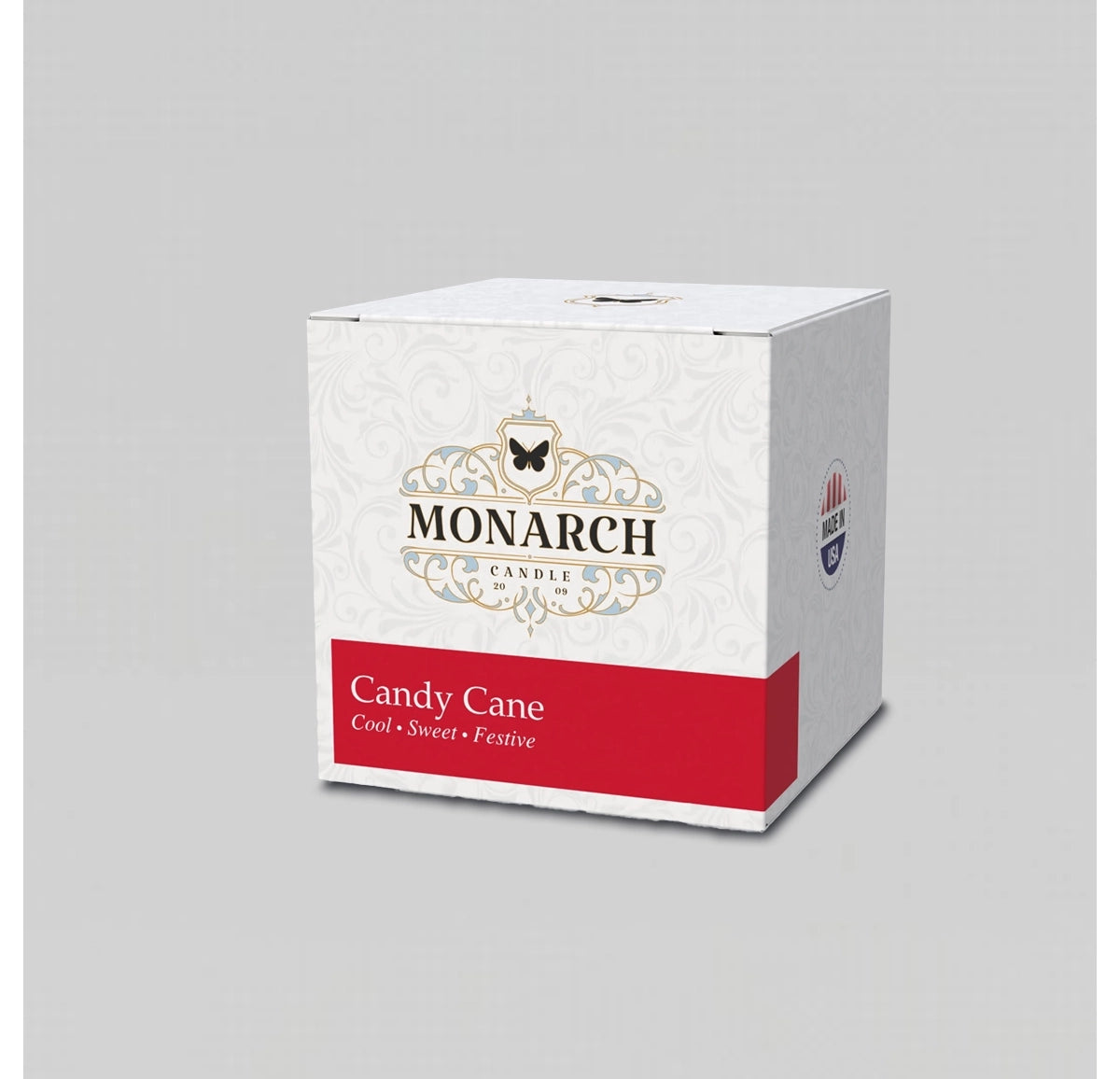 Monarch Candle votive box packaging labeled “Candy Cane” displayed on a neutral gray background.