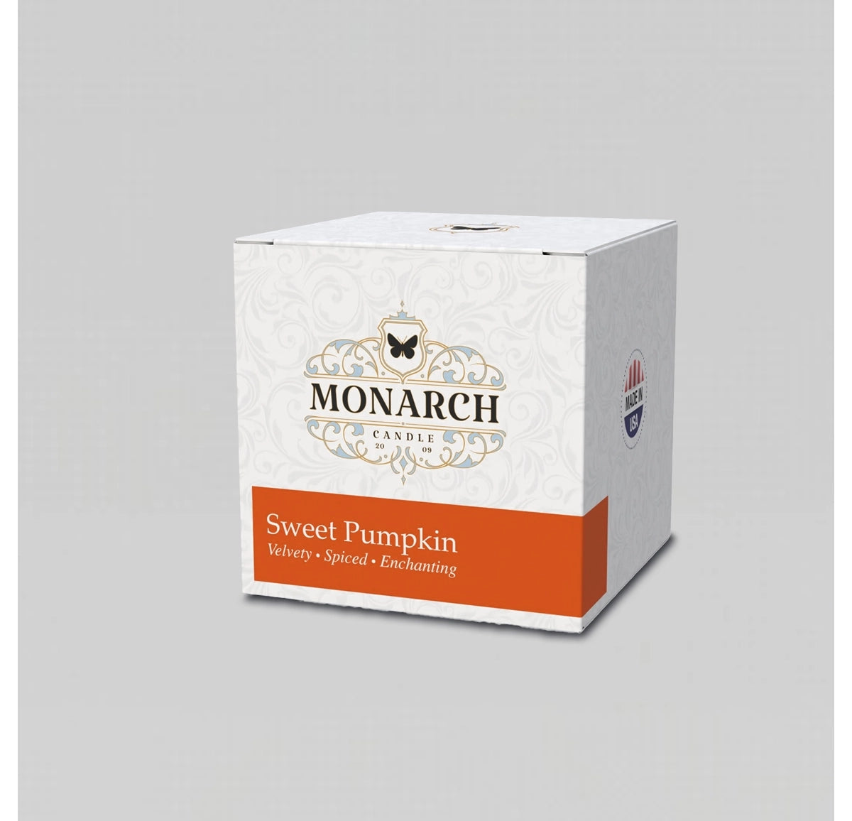 Monarch Candle votive box packaging labeled “Sweet Pumpkin” displayed on a neutral gray background.