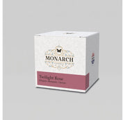 Monarch Candle votive box packaging labeled “Twilight Rose” displayed on a neutral gray background.