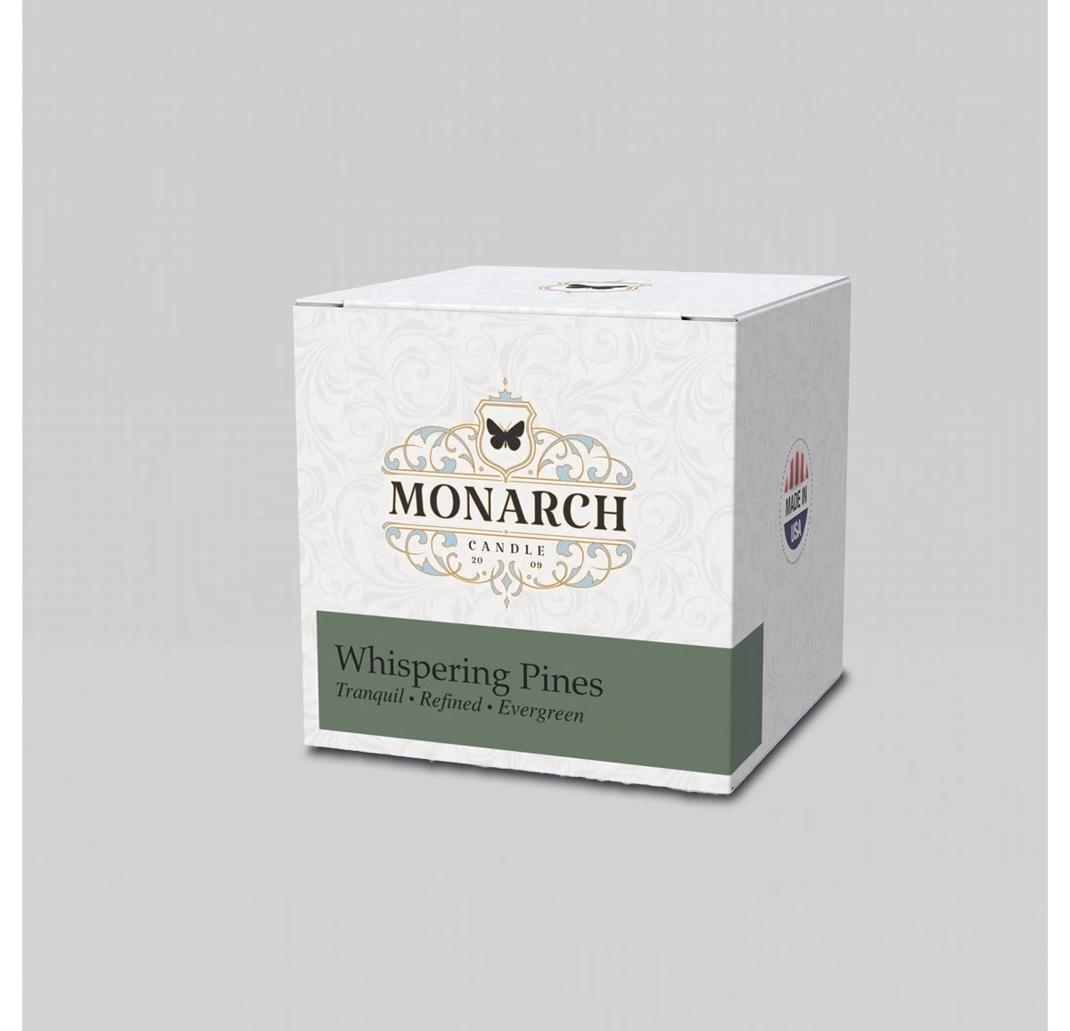 Monarch Candle votive box packaging labeled “Whispering Pines” displayed on a neutral gray background.