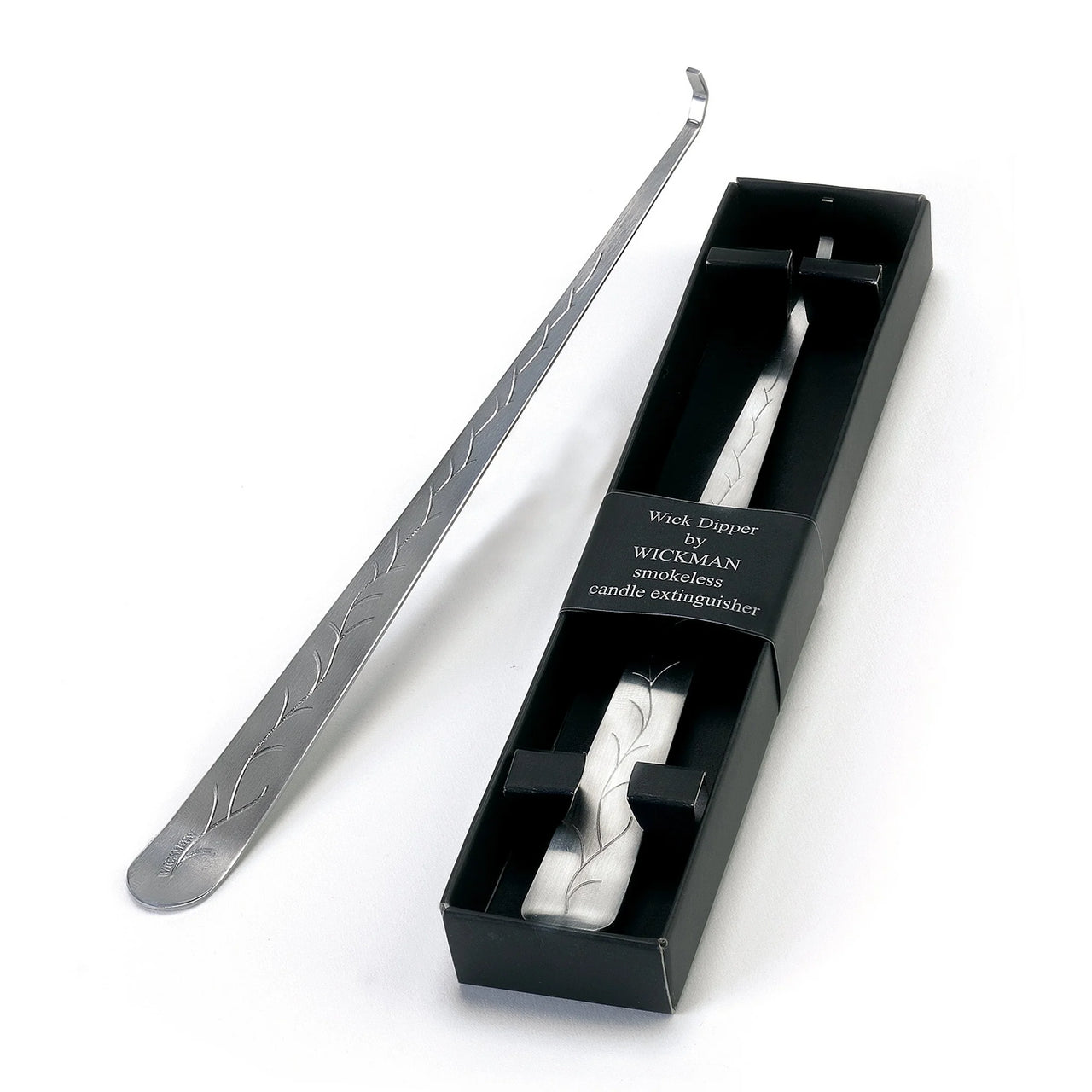 Wick Dipper by Wickaman - Smokeless candle extinguisher on white background.