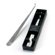 Wick Dipper by Wickaman - Smokeless candle extinguisher on white background.