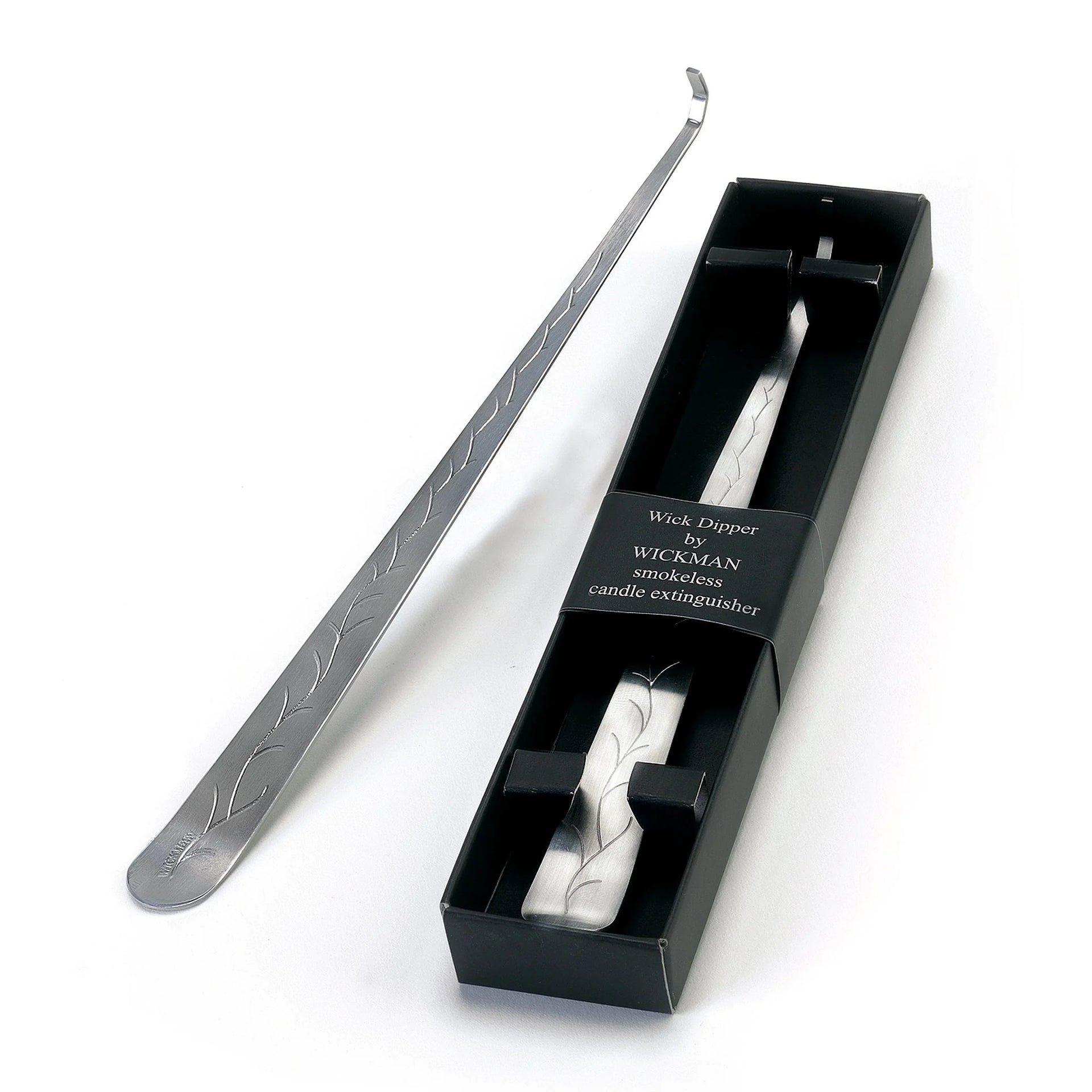 Wick Dipper by Wickaman - Smokeless candle extinguisher on white background.